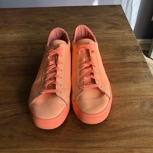 Men’s Adidas Peach color sneakers